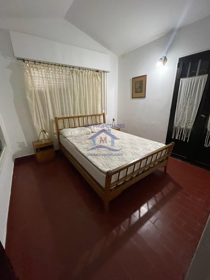 Casa mas Departamento en venta en Carlos Paz  4 dormitorios con piscina y jardin 