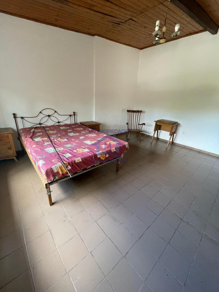 Casa mas Departamento en venta en Carlos Paz  4 dormitorios con piscina y jardin 