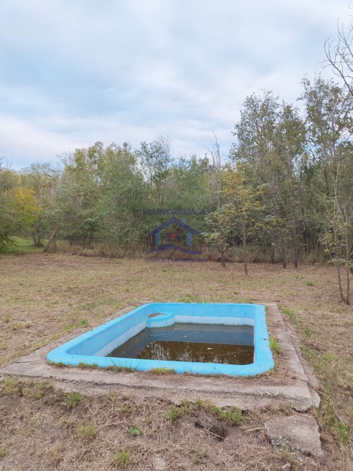Lote en venta con escritura en Cosquin 